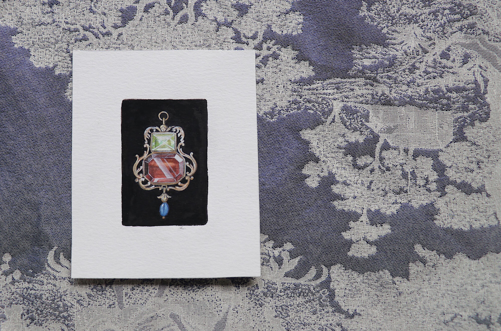 Study of a prophylactic pendant, 2018. Watercolour on paper 7×4.8cm